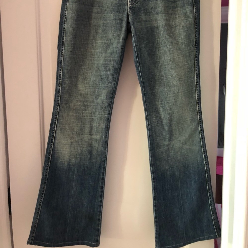 Stylish flare bottom washed out jeans!!